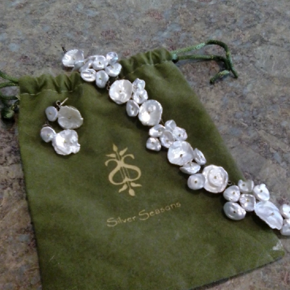 Silver Seasons White Bracelet